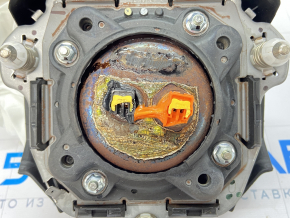 The driver's side airbag in the steering wheel of a Subaru Outback 2015-2017 exploded.
