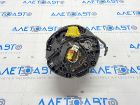 The airbag in the steering wheel of the driver's side of the VW Beetle 12-19 exploded.