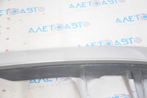 The lower trim of the rear bumper of Toyota Highlander 08-10 is worn, the fastening is broken