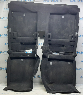 Floor covering Kia Optima 16- black, broken fasteners, needs dry cleaning