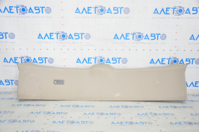 Upper plastic trunk door trim Lexus RX300 RX330 RX350 RX400h 04-09 beige, scratches, plastic turned white