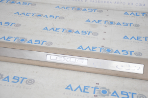 Door sill trim with illumination front left Lexus RX300 RX330 RX350 RX400h 04-09 beige, bumps, scratches