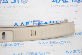 Trunk opening trim Lexus RX300 RX330 RX350 RX400h 04-09 beige, scratches, plastic turned white