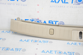 Trunk opening trim Lexus RX300 RX330 RX350 RX400h 04-09 beige, scratches, plastic turned white