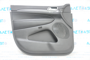 Door trim card front left Jeep Grand Cherokee WK2 17- black, with black insert leather, armrest leather, molding with chrome, under matt black wood, scratches