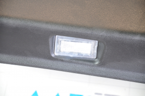 Door trim card front left Tesla Model Y 20 - black leather, with backlight, matte lining, with suede insert, with window lift control, with door opening button, varnish