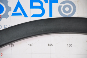 Tesla Model Y 20 rear right fender arch trim - structure, scratches