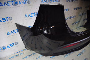 Rear bumper assembly Tesla Model Y 20- 2 parts with parking sensors, reflectors and plug black PBSB, scratches