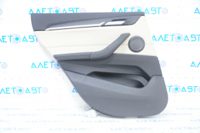 Door trim card rear left BMW X1 F48 16-22 leather beige with dark gray oyster/gray, backlight, wood insert, leather armrest, scratches
