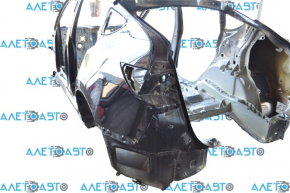 Quarter wing rear left Tesla Model Y 21- on the body, cast side member, black PBSB, bump on the threshold, scratch