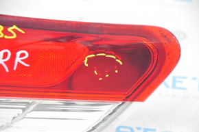 Light outer wing right Toyota Sienna 11-14 scratches, microcracks