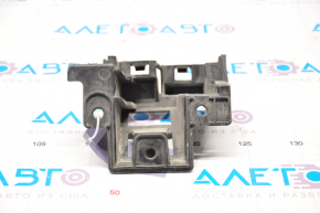 Rear bumper mount under the right light VW Jetta 11-14 USA broken mount
