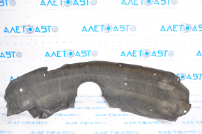 The rear right fender liner of a Toyota Camry v55 15-17 USA is torn.