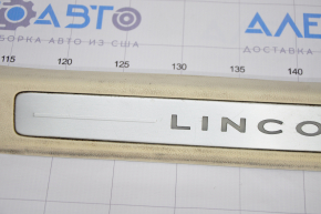 Door sill trim front left Lincoln MKC 15- beige with backlight, scratches