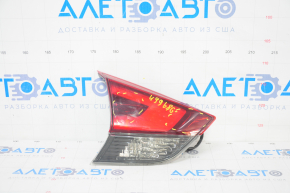 Light inside trunk lid left Nissan Rogue 17- scratches