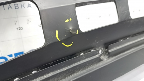 The front bumper lip of the VW Tiguan 18-24 is worn out and dented