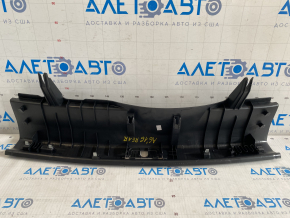 Audi A6 C7 12-18 trunk opening trim scratches, broken mount