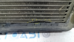 Radiator cooling engine oil BMW X5 F15 14-18 4.4T with frame, cracks on the frame, dented radiator, broken fasteners