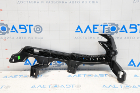 Front bumper mount for headlight left Subaru Outback 20- OEM