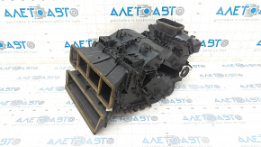 The bare air conditioner housing, left side of a Toyota Camry v40.