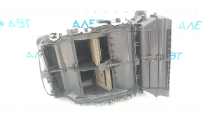 The bare air conditioner housing, left side of a Toyota Camry v40.