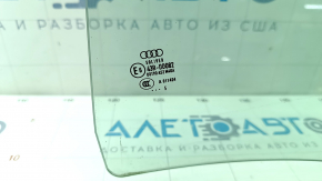 Glass of the rear left door Audi A6 C7 12-18