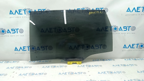 Glass of the rear left door Lincoln Nautilus 19-23 tinted, triplex