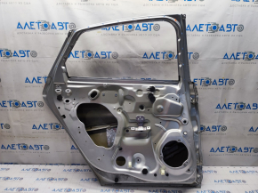 Door bare rear left Ford Fusion mk5 13-20 silver UX, dents
