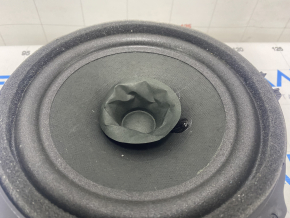 The rear right door speaker Ford Ecosport 18-22 is dented, the guides are broken