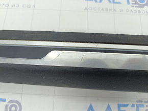 Right threshold trim VW Jetta 19- black with chrome molding and backlight, scratches, bump on the trim