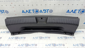 VW Jetta 19 trunk opening trim - scratches, broken mount