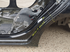 Sunset of the wing arch rear left Chevrolet Malibu 16- black on the body, dented