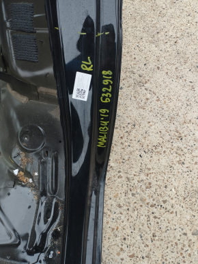 Sunset of the wing arch rear left Chevrolet Malibu 16- black on the body, dented