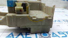 The Lexus ES 300/330 under-dash fuse box has cracks and broken fasteners.