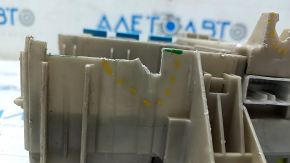 The Lexus ES 300/330 under-dash fuse box has cracks and broken fasteners.