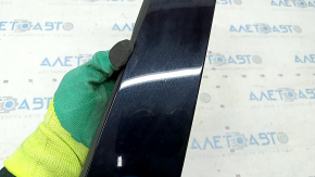 Door trim side rear left Audi Q3 8U 15-18 black gloss, scratches
