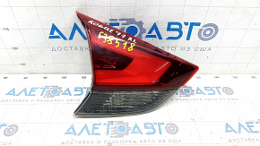 Light inside trunk lid left Nissan Rogue 17- scratches