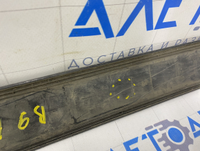 Door trim lower front right Subaru b9 Tribeca scratches, broken fastening, bumps