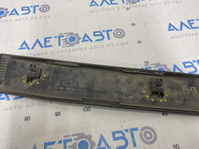 Door trim lower rear left Subaru b9 Tribeca scratches, broken fastener