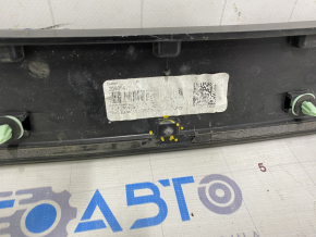 Chevrolet Volt 11-15 hood molding scratches, broken mount