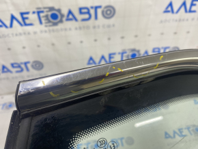 Window blind glass rear right VW Jetta 19- chrome, scratches on chrome, scratches on molding