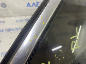 Window blind glass rear left VW Passat b7 12-15 USA chrome, scratches on chrome, scratches on glass