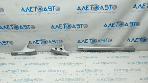 Audi Q7 16 front panel inserts - aluminum, quattro, cracks in fasteners, pressed