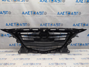 Radiator grill assembly with badge Mazda 3 14-18 BM prerest, sand, bumps, cracks