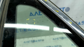 Window blind glass front left Lexus Hs250h 10-12 scratches on chrome, scratch on glass