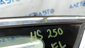 Window blind glass front left Lexus Hs250h 10-12 scratches on chrome, scratch on glass