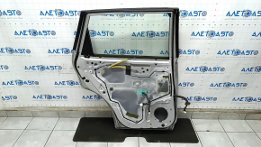 Door assembly rear left Nissan Rogue 14-20 silver K23, dents