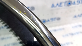 Window blind glass rear left VW Jetta 19- chrome scratches on chrome, scratches on glass