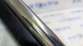 Window blind glass rear left VW Jetta 19- chrome scratches on chrome, scratches on glass