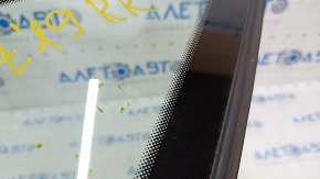 Window blind glass rear right VW Jetta 19- chrome, scratches on chrome, scratches on glass